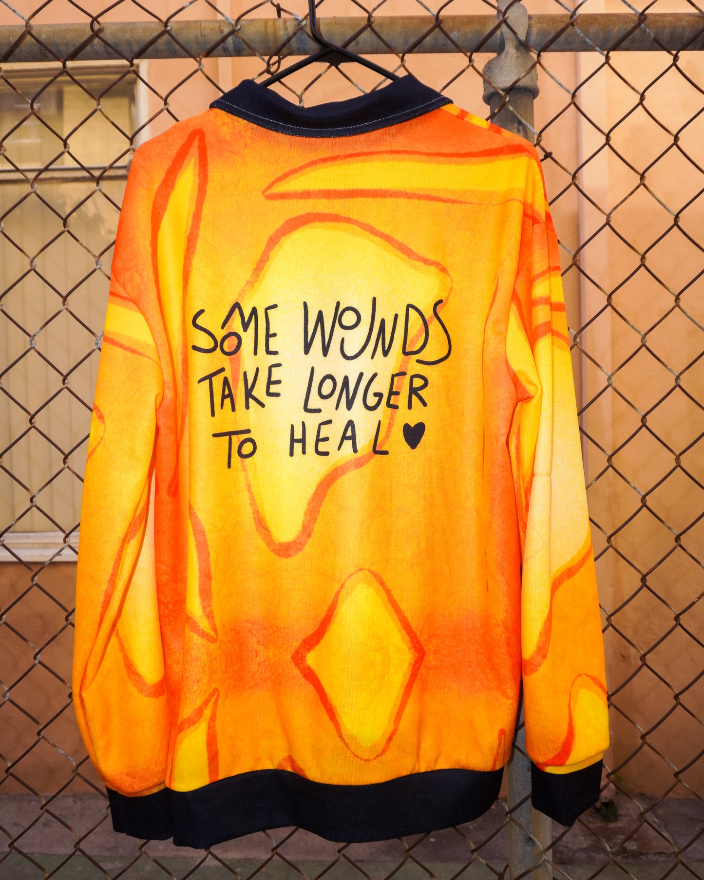 Some Wounds Take Longer to Heal Sweater